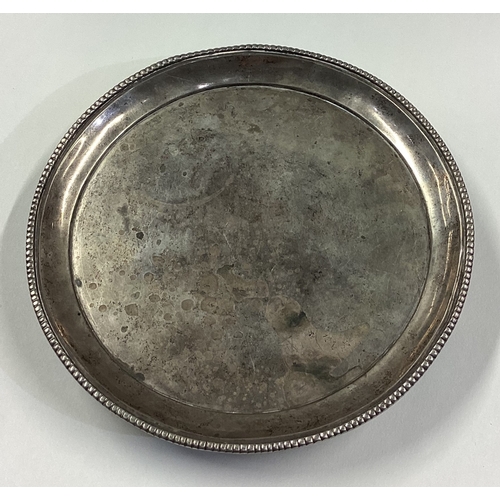 106 - A Continental 18th Century silver salver. Marked to base. Approx. 301 grams. Est. £300 - £400.