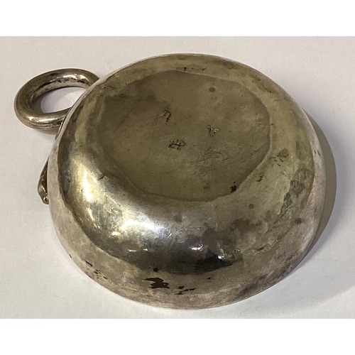 156 - An early 18th Century French silver wine taster. Marked to base. Approx. 80 grams. Est. £200 - £300.