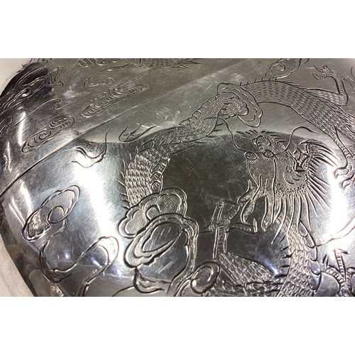 170 - A rare oversized Chinese export silver flask with engraved decoration of farming scenes to one side ... 