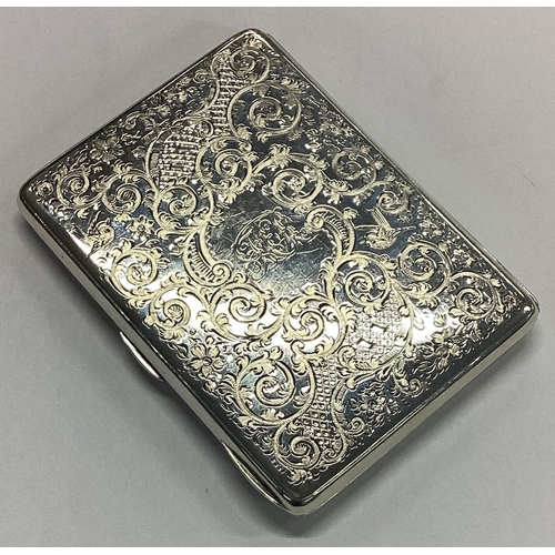 186 - A good quality engraved silver card case with fitted interior. Birmingham. By GU. Approx. 129 grams.... 