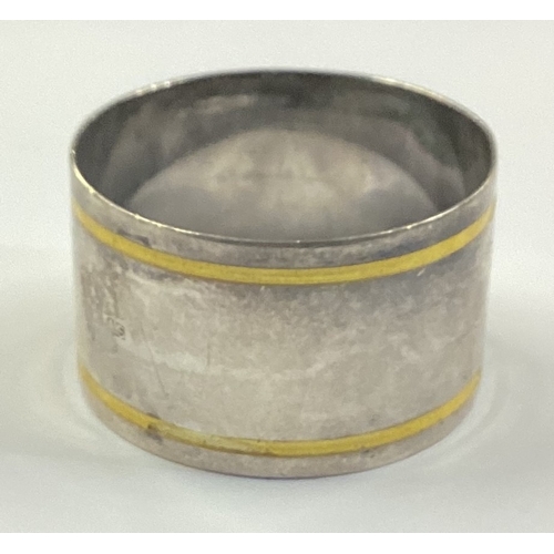 199 - A silver and enamelled napkin ring. Birmingham 1901. Approx. 25 grams. Est. £30 - £40.