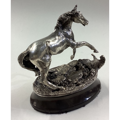 204 - A fine Naturalistic cast silver figure of a horse on plinth. Approx. 721 grams of gross weight. Est.... 