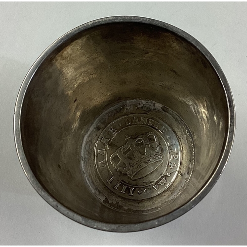 210 - An early 18th Century German silver beaker with coin inset to centre. Approx. 91 grams. Est. £350 - ... 