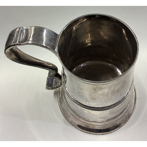 213 - NEWCASTLE: A large and oversized 18th Century silver tankard. Marked to base. Approx. 492 grams. Est... 