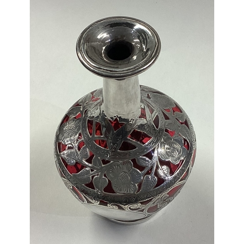 215 - A silver overlaid vase. Birmingham. Approx. 322 grams. Est. £60 - £80.