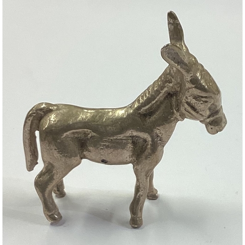 218 - A silver figure of a donkey. Approx. 37 grams. Est. £50 - £80.