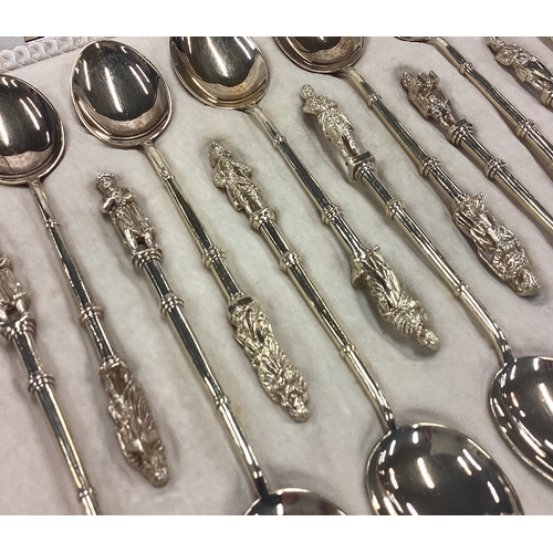 220 - A good cased set of twelve silver gilt Apostle top spoons. Sheffield. Retailed By Harrods. Approx. 2... 