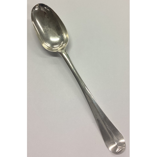 221 - A good Georgian silver Hanoverian pattern spoon. Punched to reverse. Approx. 54 grams. Est. £20 - £3... 