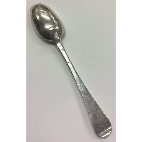 221 - A good Georgian silver Hanoverian pattern spoon. Punched to reverse. Approx. 54 grams. Est. £20 - £3... 