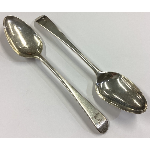 23 - A pair of 18th Century silver bottom marked spoons. Approx. 78 grams. Est. £80 - £120.