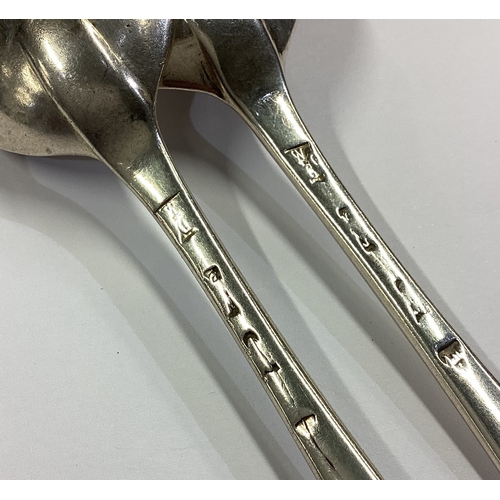 23 - A pair of 18th Century silver bottom marked spoons. Approx. 78 grams. Est. £80 - £120.