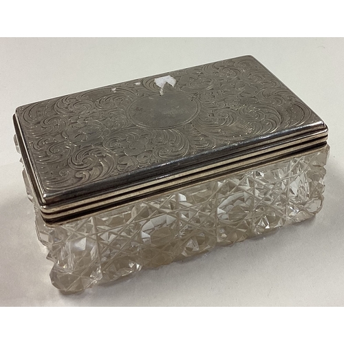 230 - A Victorian silver and glass snuff box with engraved decoration. London 1845. Est. £50 - £80.