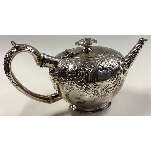 255 - A 19th Century silver bullet shaped teapot. Approx. 328 grams. Est. £300 - £400.