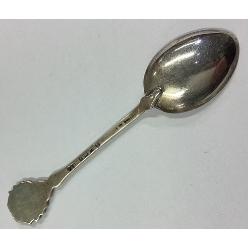 269 - A silver and enamelled spoon with thistle terminal. Birmingham 1959. By Toye, Kenning & Spencer. App... 