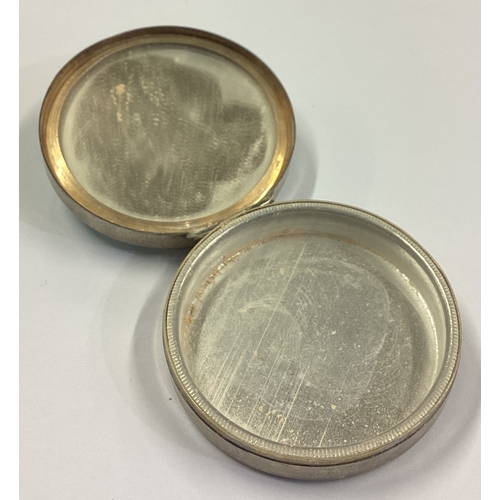 278 - A silver and green enamelled compact. Birmingham 1927. Approx. 41 grams. Est. £100 - £150.