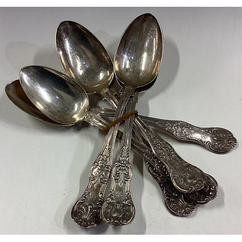 289 - A set of six silver King's pattern single struck dessert spoons. By PA. Approx. 266 grams. Est. £80 ... 