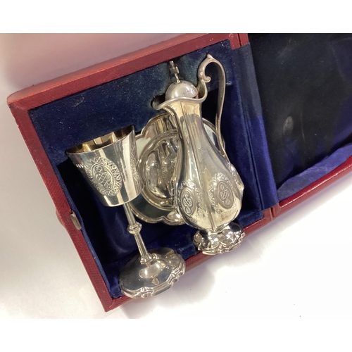 290 - A good quality cased Victorian silver three-piece communion set. London. Approx. 152 grams. Est. £80... 