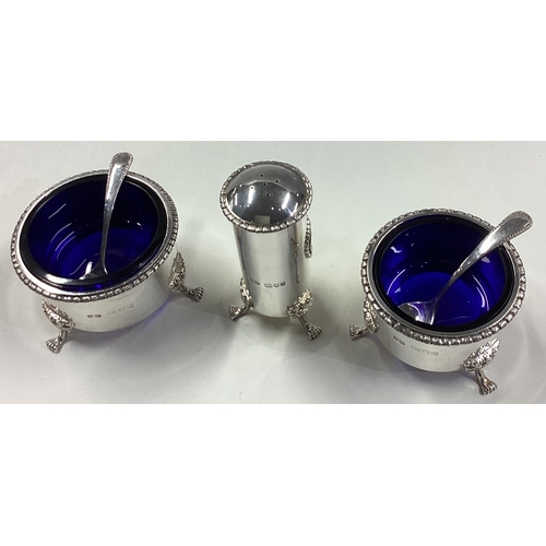 291 - CHRISTOPHER LAWRENCE: A silver condiment set. London 1986. Approx. 234 grams. Est. £300 - £400.