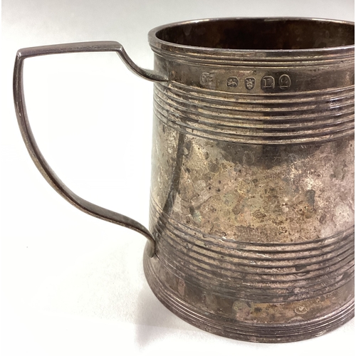 293 - A heavy George III silver reeded mug. London 1806. By John Emes. Approx. 156 grams. Est. £150 - £200... 