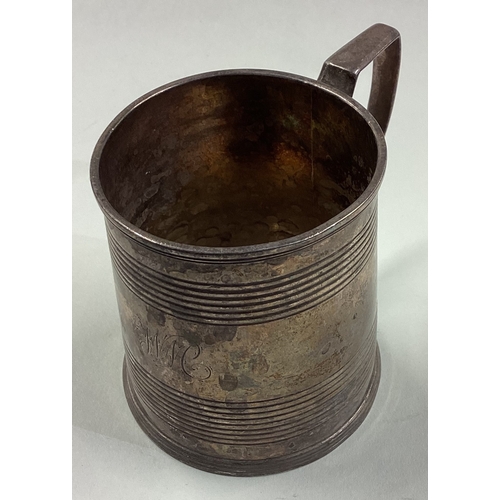 293 - A heavy George III silver reeded mug. London 1806. By John Emes. Approx. 156 grams. Est. £150 - £200... 