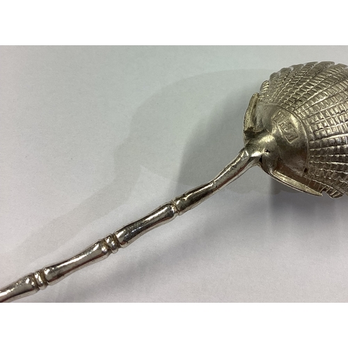 301 - WANG HING: A 19th Century Chinese export silver spoon with chinoiserie decoration. Approx. 15 grams.... 