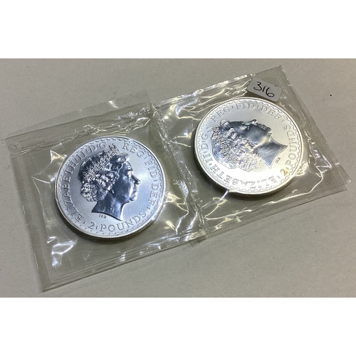 316 - Two heavy Proof silver ounce coins. Est. £30 - £50.