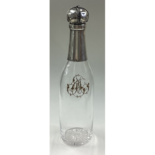 327 - A French silver mounted and glass champagne bottle. Est. £300 - £400.