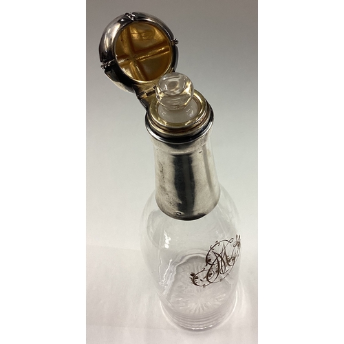 327 - A French silver mounted and glass champagne bottle. Est. £300 - £400.