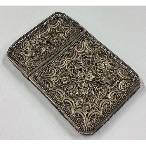 331 - A Chinese filigree silver card case with lift-off cover. Approx. 53 grams. Est. £100 - £150.