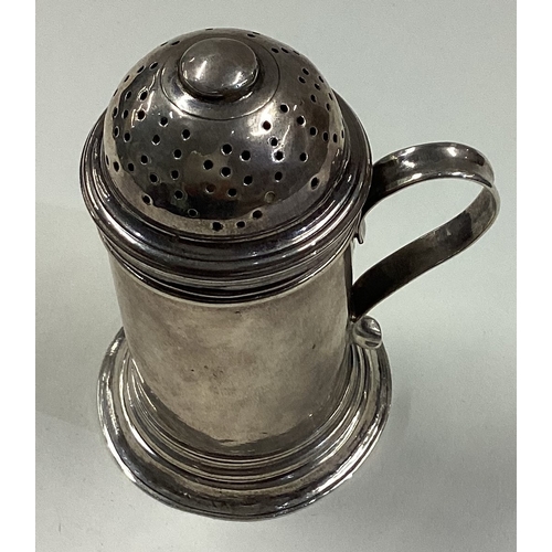 333 - An 18th Century silver kitchen pepper with handle. London 1727. Approx. 80 grams. Est. £250 - £300.