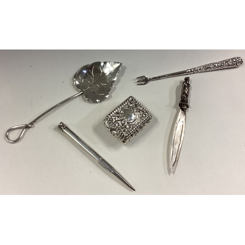 339 - A box containing a chased silver preserve spoon, pickle fork etc. Approx. 61 grams. Est. £30 - £50.