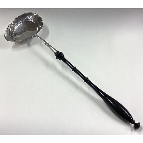 347 - An 18th Century Continental silver toddy ladle. Approx. 110 grams. Est. £200 - £300.