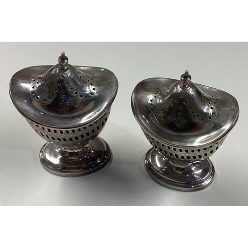 350 - A pair of silver and BGL casters. London 1937. Approx. 122 grams. Est. £100 - £150.