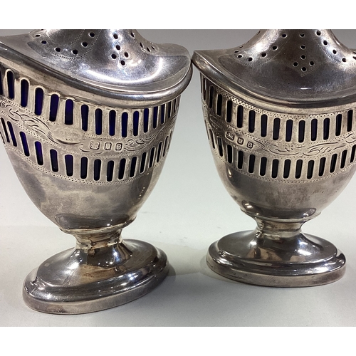 350 - A pair of silver and BGL casters. London 1937. Approx. 122 grams. Est. £100 - £150.