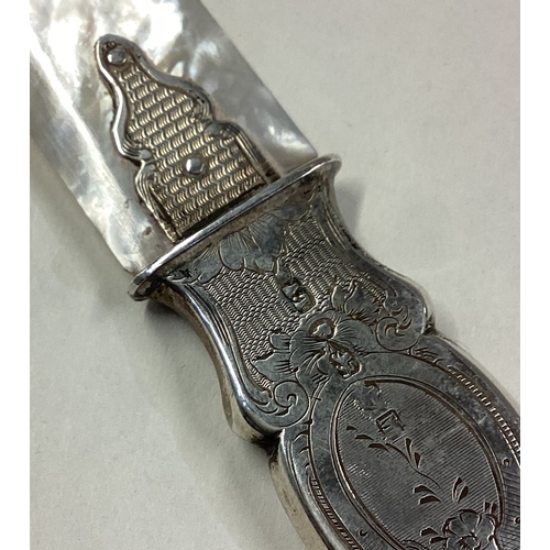 353 - A Victorian silver and MOP letter opener. Birmingham 1861. Approx. 54 grams. Est. £120 - £150.