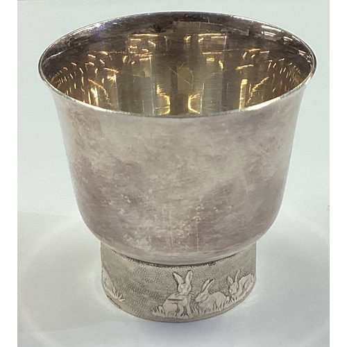 375 - A silver plated child's egg cup. Marked to base. Est. £20 - £30.