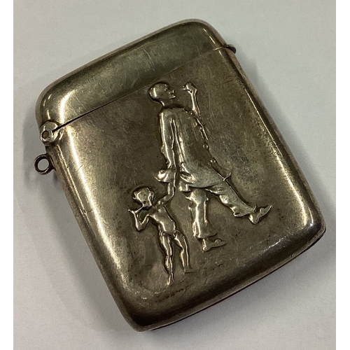 381 - An Art Nouveau silver vesta case chased with father and son. Approx. 19 grams. Est. £40 - £60.