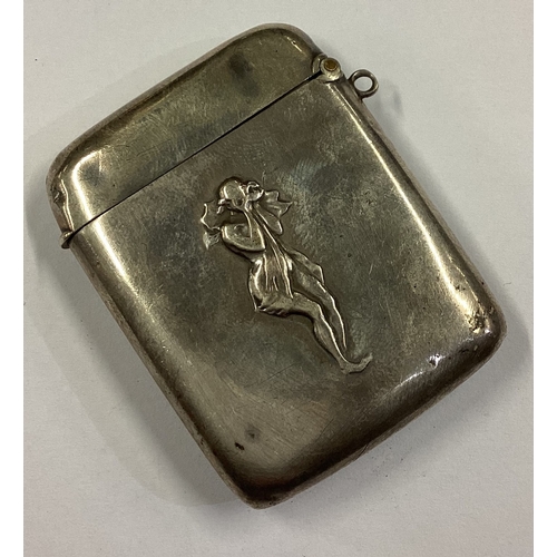 381 - An Art Nouveau silver vesta case chased with father and son. Approx. 19 grams. Est. £40 - £60.