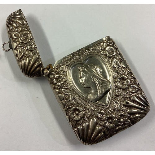 385 - A good quality Victorian silver vesta case with chased decoration depicting Queen Victoria. Birmingh... 