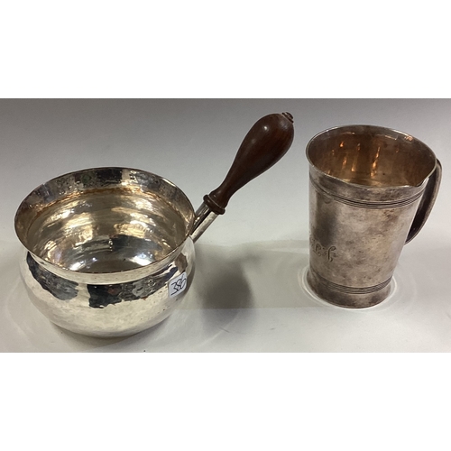 386 - A good silver plated shot measurer together with a brandy pan. Est. £20 - £30.