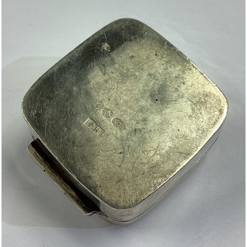 39 - An engraved silver pill box with hinged lid bearing English import marks. Fully marked to base. Appr... 