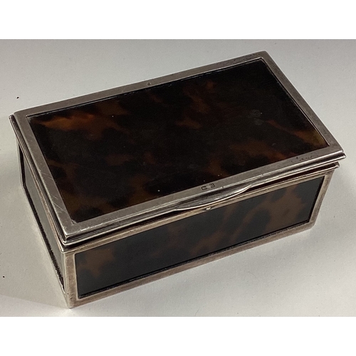 390 - An attractive silver mounted and tortoiseshell dressing table box. Birmingham. By HA. Approx. 122 gr... 