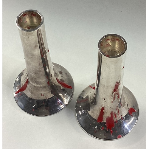 392 - GEORG JENSEN: A fine pair of plain silver candlesticks. Approx. 391 grams. Est. £1000 - £1500.