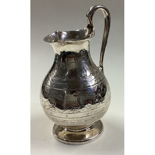 393 - A Victorian silver jug engraved with classical scenes. London 1849. By George Reilly. Approx. 140 gr... 