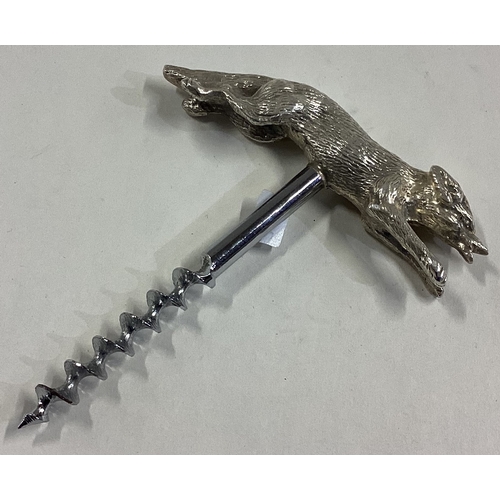 396 - A silver corkscrew in the form of a fox. Birmingham 1968. Approx. 80 grams. Est. £250 - £300.