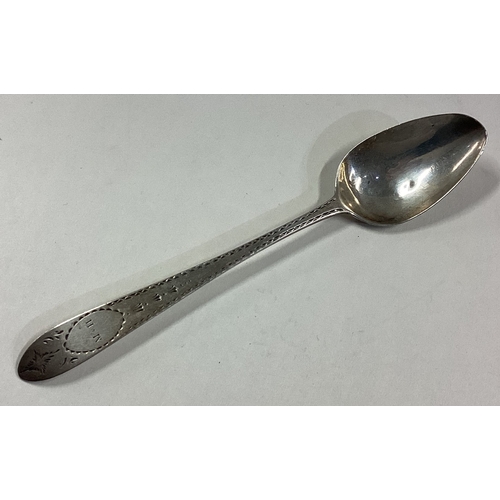 403 - An 18th Century Irish silver spoon with bright-cut decoration. Circa 1770. Approx. 16 grams. Est. £2... 