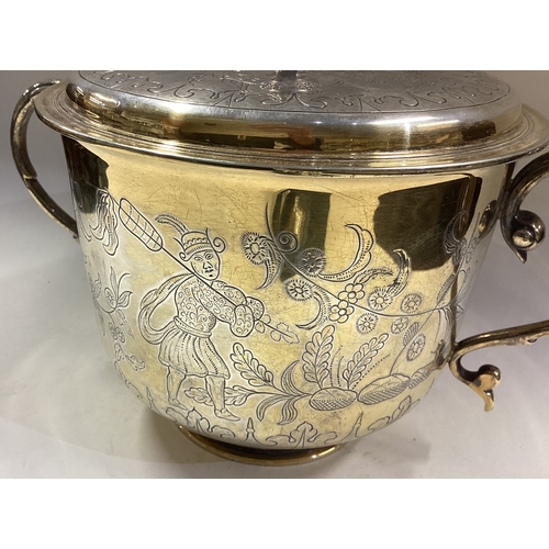 405 - A fine and rare Chinoiserie silver cup and cover. London 1938. By C J Vander. Approx. 1064 grams. Es... 