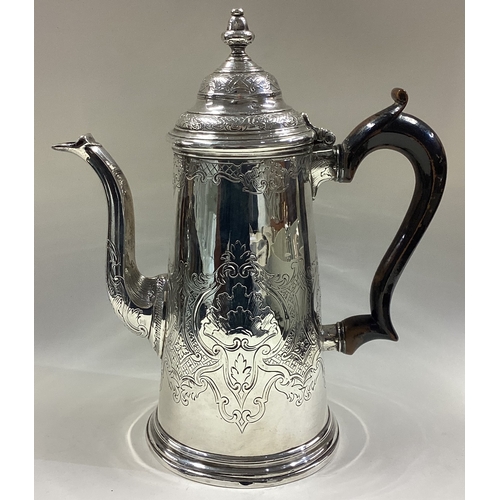 411 - An early 18th Century Queen Anne silver coffeepot. London 1709. Approx. 694 grams. Est. £700 - £800.