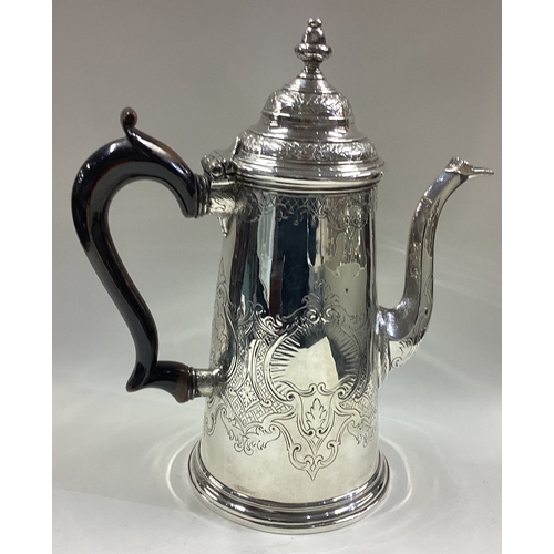 411 - An early 18th Century Queen Anne silver coffeepot. London 1709. Approx. 694 grams. Est. £700 - £800.