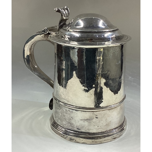 419 - A George I silver lidded tankard. 1724. Approx. 521 grams. Est. £1500 - £2000.